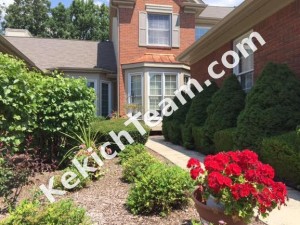 front of country club village condo for sale in northville