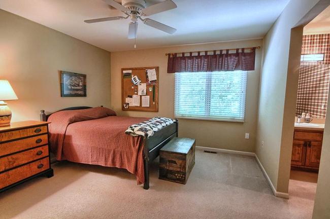 large bedroom in a luxury home for sale